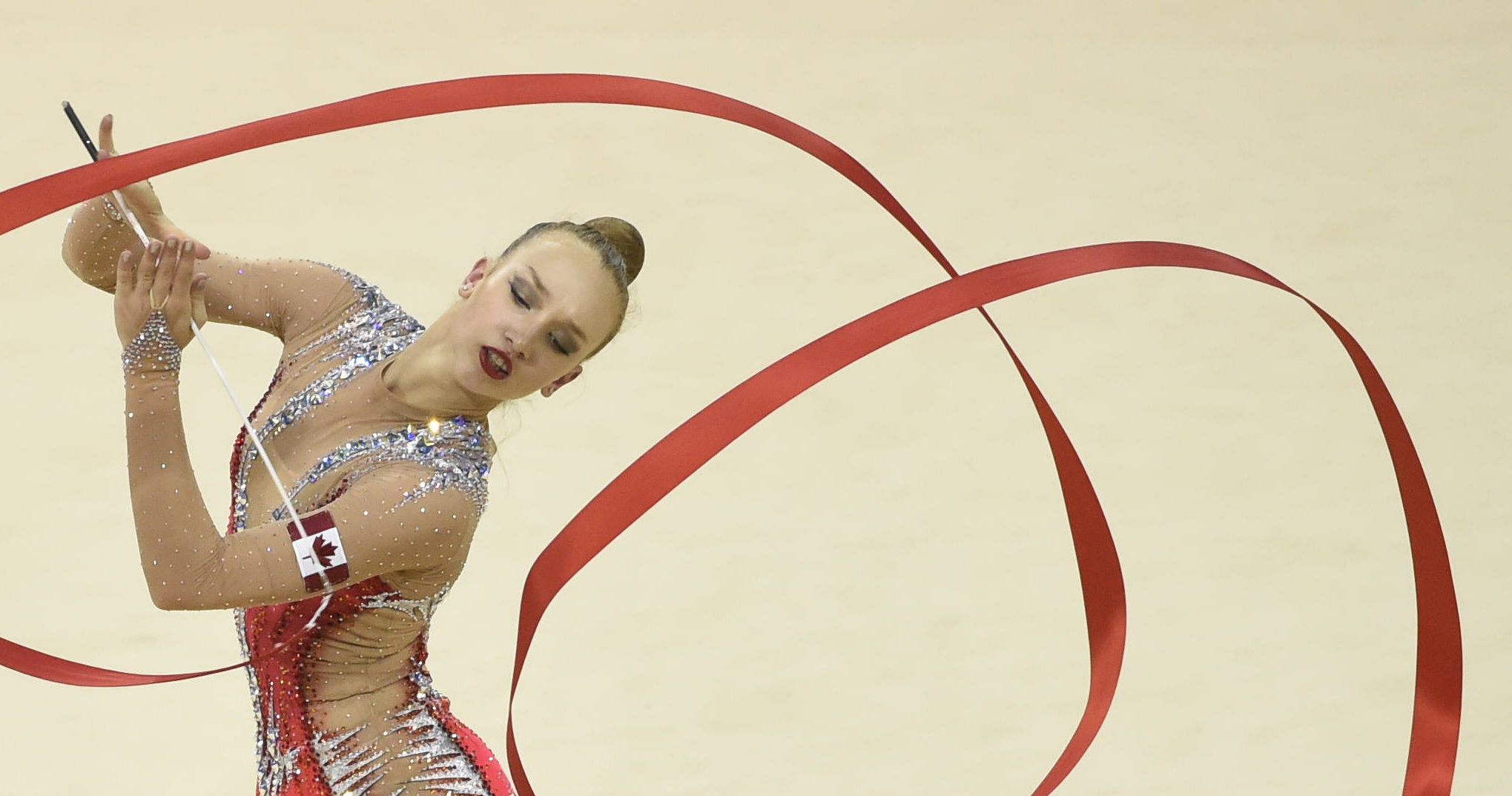 artistic gymnastics athlete is performing